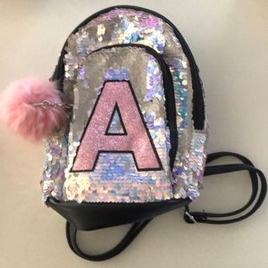 Justice mini backpack, near new condition